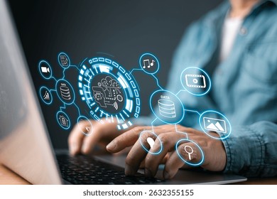 A person works on a laptop with a holographic interface displaying AI, data storage, and multimedia icons, representing digital transformation, smart technology, and big data management systems.