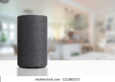Personal assistant loudspeaker on a white wooden shelf of a smart home kitchen. Empty copy space for Editor's text.