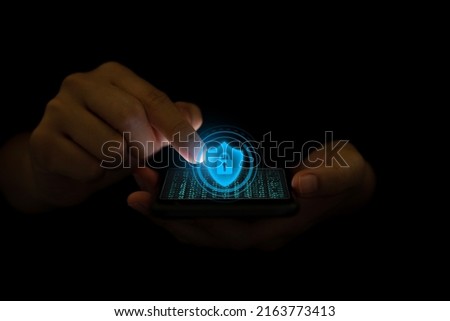 Personal Data Protection Act or PDPA concept. hand holding a smartphone along with graphics of protection from data theft.Personal data protection act both forms of the personal data privacy policy 