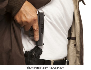 PERSONAL DEFENSE | Concealed Carry Gun In Holster On Belt.  Mature Adult With Firearm Or Pistol.