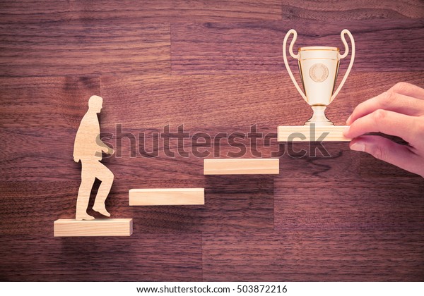 Personal development,\
personal and career growth, progress and potential concepts. Coach\
(human resources officer, manager, mentor) motivate employee to\
growth with cup.