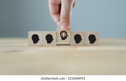 Personal ethics concept. Ethical mindset. Business integrity and moral. Selecting wooden cubes with ethical person. Hiring, recruitment, promoted employee. Company culture and sustainable success.
