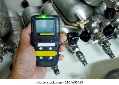 Personal H2S Gas Detector,Check Gas Leak. Safety Concept Of Safety And Security System On Offshore Oil And Gas Processing Platform, Hand Hold Gas Detector For Check Hydrocarbon Leak To Protect Fire An