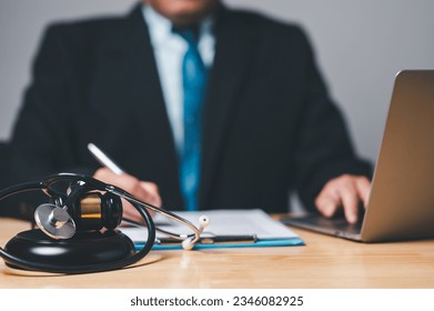 A personal injury lawyer holds the authority in law to guide clients toward a just decision, wielding the gavel of justice. - Shutterstock ID 2346082925