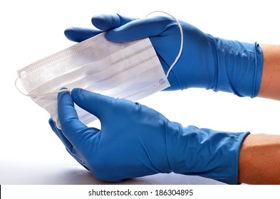 Personal Means Of Protection Surgical Gloves For Hands And Mask On A White Background