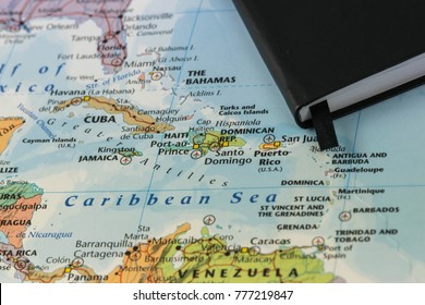 personal notes of someone planning a trip to the caribbean sea over a closeup map of Cuba, Haiti, Jamaica, Dominican, puertorico and the Bahamas - Shutterstock ID 777219847
