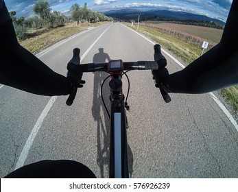 Personal Perspective Of A Cyclist Riding A Road Bicycle On The Amazing Roads Of Tuscan Countryside In Winter Season. POV