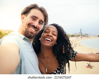 Personal Perspective Of A Young Heterosexual Couple Taking A Selfie During A Sunset On Vacation. Honeymoon Concept