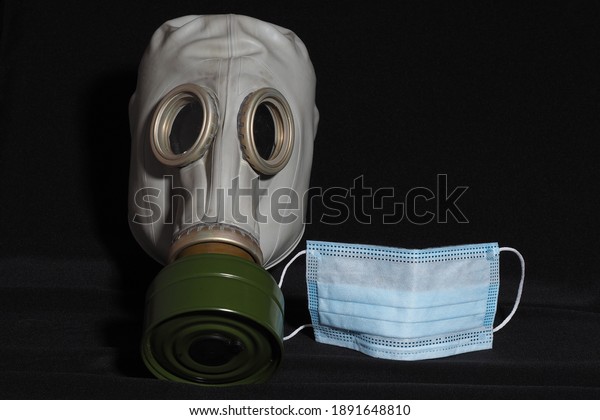 Personal protective equipment. Covid-19. A gas mask\
and a medical mask.