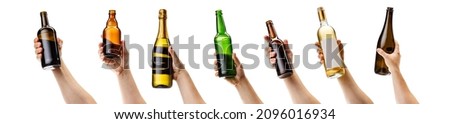 Personal taste. Collage of many hands holding various alcohol bottles isolated over white background. Concept of alcohol, drink, party, degustation, holiday. Copy space for ad