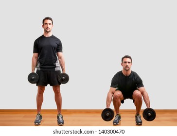 Personal Trainer Doing Dumbbell Squat For Training His Legs