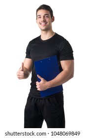 Personal Trainer In A Gym Holding A Notepad Isolated In White