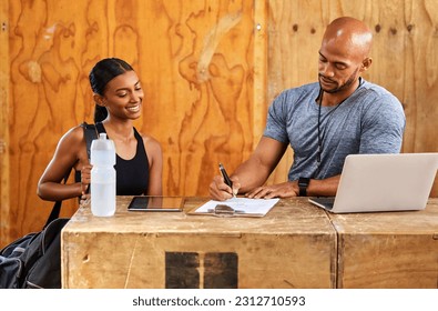 Personal trainer, happy woman or man writing on clipboard for gym membership or sign up for health. Start, fitness contract or girl client talking to instructor for coaching services or application - Powered by Shutterstock