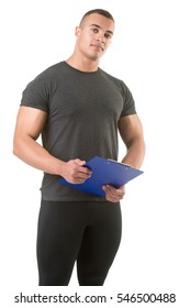 Personal Trainer, With A Pad In His Hand, Isolated In White