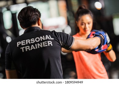 personal trainer is practicing boxing - Powered by Shutterstock