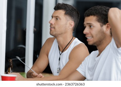 personal trainers in a gym - Powered by Shutterstock