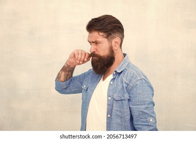 Personality and character. Charisma concept. Bearded well groomed hipster. Good looking guy wear fashion clothes. Barbershop fashion. Charismatic barber with beard and mustache. Denim fashion trends
