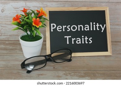 personality traits concept. blackboard with potted flower - Shutterstock ID 2216003697
