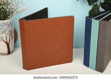 Personalized binding, leather folder cover, leather binding, binder, binder, office binding, corporate gift. Concept shot leather binding, top view, brown color