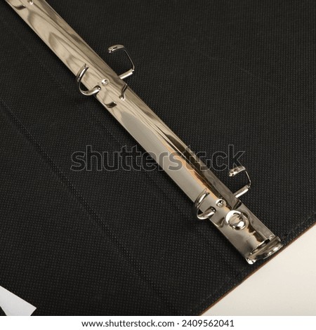 Personalized binding, leather folder cover, leather binding, binder, binder, office binding, corporate gift. Concept shot leather binding, top view, black fabric inside view