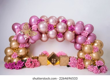 Personalized romantic enchanted garden decor, with colorful balloon arch and dolls, enchanted garden illustration, for studio photo shoots.  Great for family rehearsals and also for smash the cake.