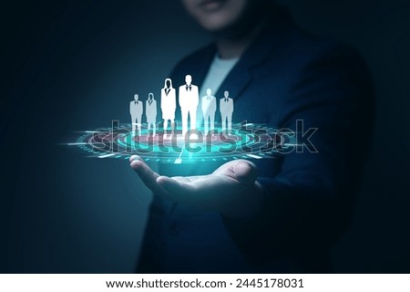 Personnel recruitment concept, job placement, strategic planning for personnel management and teamwork for success. businessman hand holding virtual businessman icon