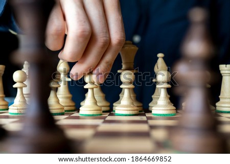 Similar – Image, Stock Photo Boy of primary school age plays chess