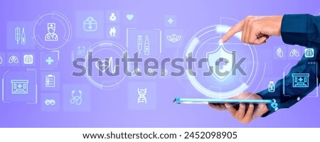 A person's hand touching a tablet displaying healthcare icons on a purple background, illustrating technology in medicine