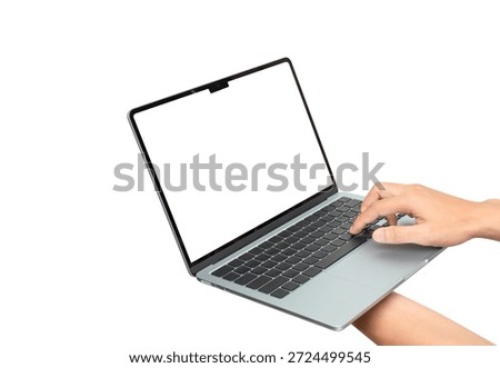 A person's hands holding and using a modern, thin silver laptop with a blank white screen (mockup). Isolated on a white background, emphasizing technology, online work, digital communication, and port