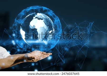 A person's hands presenting a digital globe with a network pattern, on a dark background, concept of global connectivity