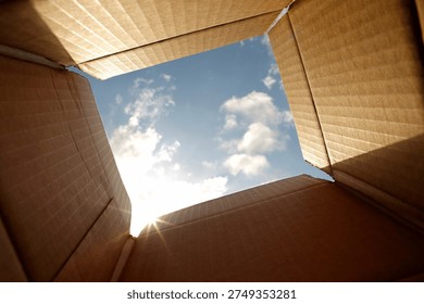 Perspective from bottom of package toward open sky, conceptual vision of opportunity and limitless possibilities
