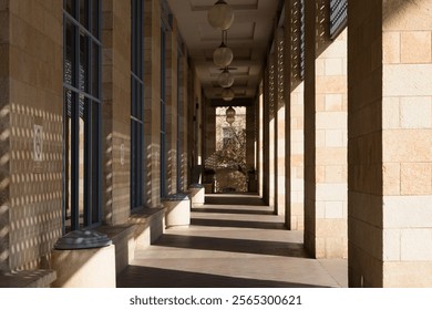 Perspective in a building with shadow and sunlight
