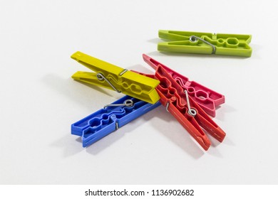 Perspective close-up shot of multiple color clothespins