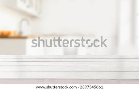 Perspective light empty wooden table from above on blurred background can be used mockup to display installation products or design layout.