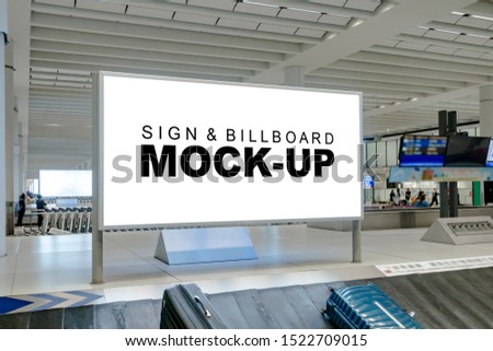 Perspective mock up blank large horizontal billboard with clipping path at baggage claim point in airport terminal, empty space for advertising or public information, advertisement concept