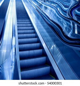 Perspective Moving Escalator In Airport With Blue Right Side