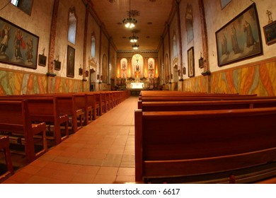perspective of pews before an alter