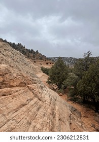 Perspective shot of orange sandstone cliff face