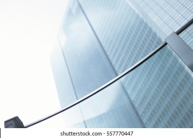 Perspective and underside angle view to textured background of modern glass building
