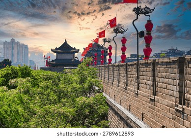 Perspective view of the ancient massive stone wall and watchtower adorned with red lanterns in Xi'an, Shaanxi, China