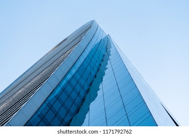 Perspective View From Below On A Single Modern Office Corporate Building Made Of Glass