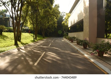 A perspective view of a building and a road.