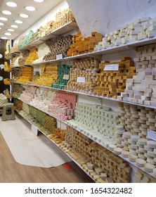 The Perspective View Of Colourful Soap Bars On The Shelves In An Store. The Tag Note : 