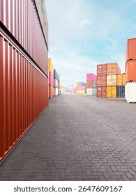 A perspective view of a container yard with stacked red, yellow, white and multicolored cargo containers. Industrial port scene representing global trade, shipping, and logistics.