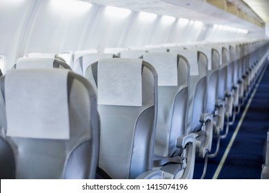 Perspective view of empty aircraft seats and lights