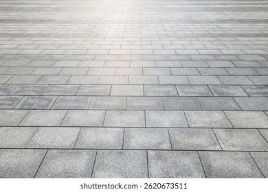 Perspective view of empty grey stone tile floor background with geometric pattern and texture suitable for product display or backdrop presentation.
