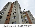 Perspective view of flat of blocks from Communist period, worn out concrete buildings in Eastern Europe