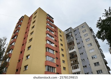 Perspective view of flat of blocks from Communist period, worn out concrete buildings in Eastern Europe