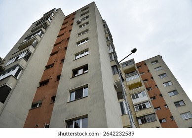 Perspective view of flat of blocks from Communist period, worn out concrete buildings in Eastern Europe