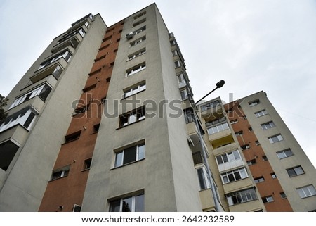 Perspective view of flat of blocks from Communist period, worn out concrete buildings in Eastern Europe